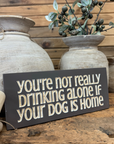 "You're not drinking alone" Sign